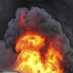 Flames and black smoke - air pollution concept.